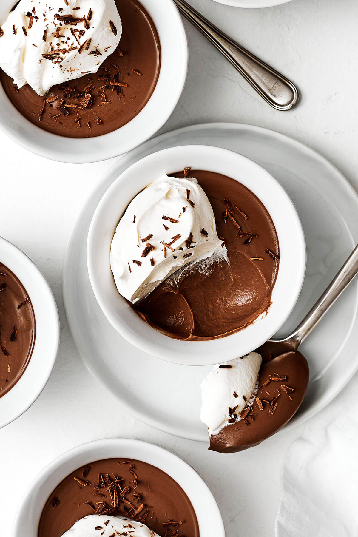 A half eaten chocolate pot de creme.