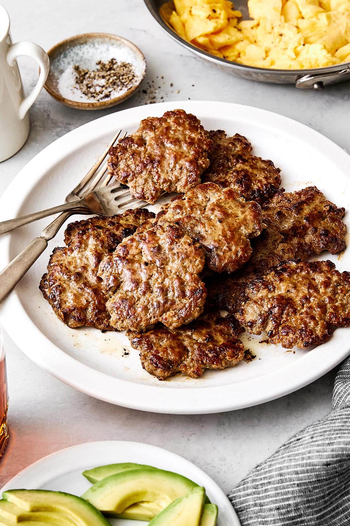 Savory and juicy, this homemade breakfast sausage adds a flavorful protein boost to your morning—and it’s way better than store-bought. A plate of breakfast sausages.