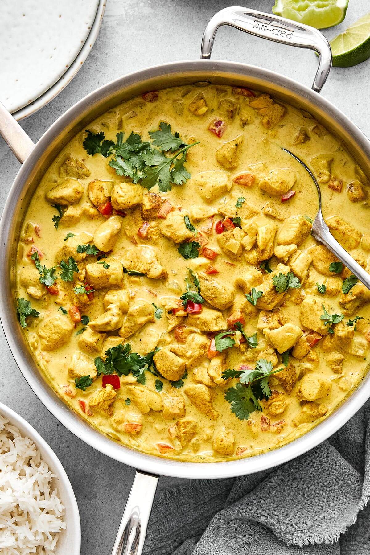 Coconut curry chicken is a cozy one-pan meal that’s packed with comforting flavor. A pan of coconut curry chicken.