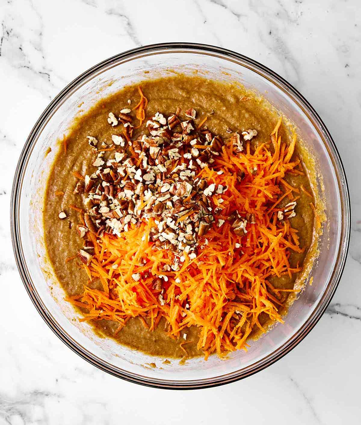 This gluten-free carrot cake has been a reader favorite for years! It’s made with three layers of perfectly spiced carrot cake and just the right amount of cream cheese frosting for a deliciously sweet bite. Step two of gluten-free carrot cake: make the batter.