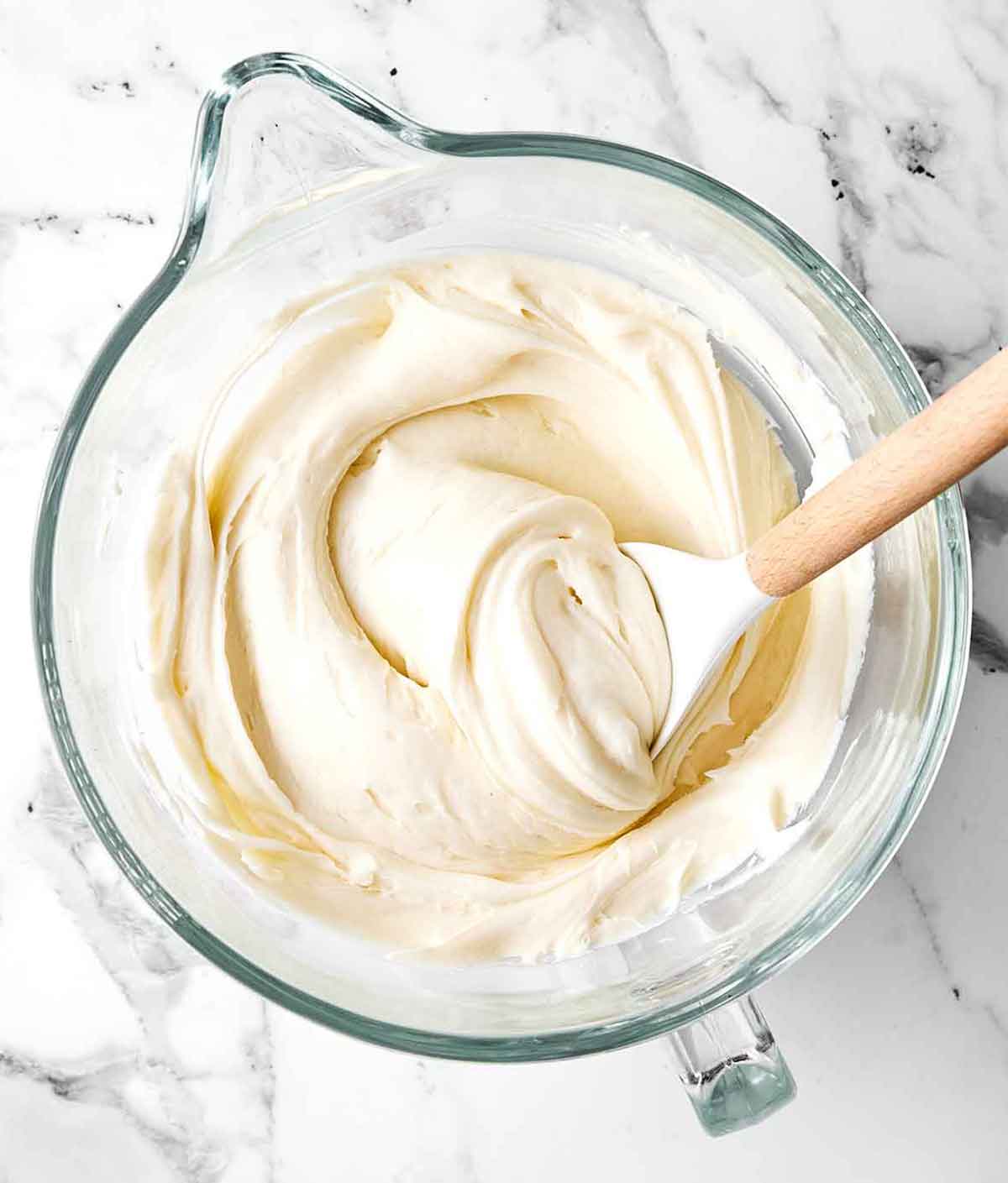 This gluten-free carrot cake has been a reader favorite for years! It’s made with three layers of perfectly spiced carrot cake and just the right amount of cream cheese frosting for a deliciously sweet bite. Step four of carrot cake: make the frosting.