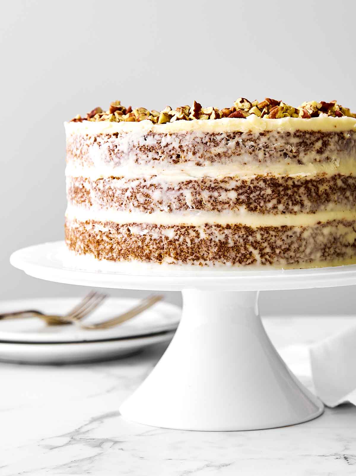 This gluten-free carrot cake has been a reader favorite for years! It’s made with three layers of perfectly spiced carrot cake and just the right amount of cream cheese frosting for a deliciously sweet bite. Gluten-free carrot cake recipe.