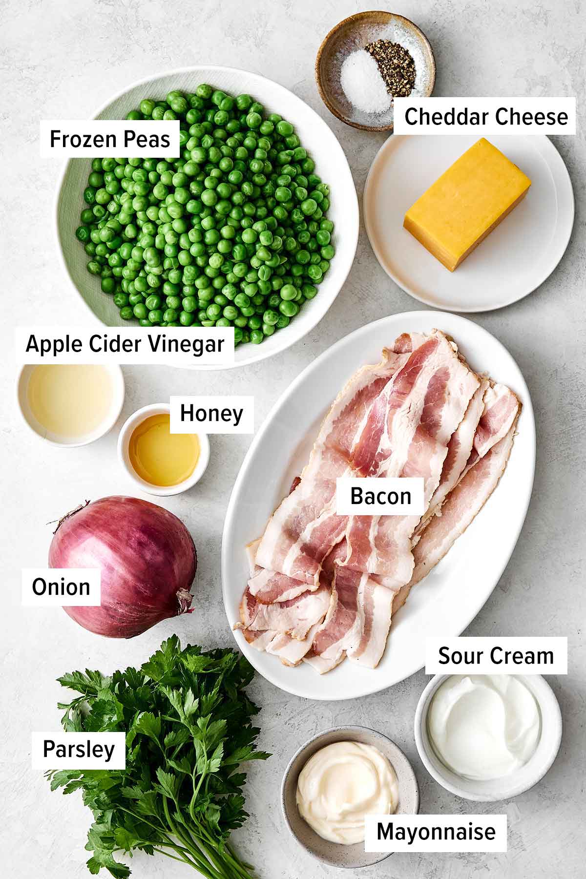 This creamy pea salad has become a spring and summer staple! It's simple, flavorful, and perfect for potlucks and group gatherings. Pea salad ingredients.