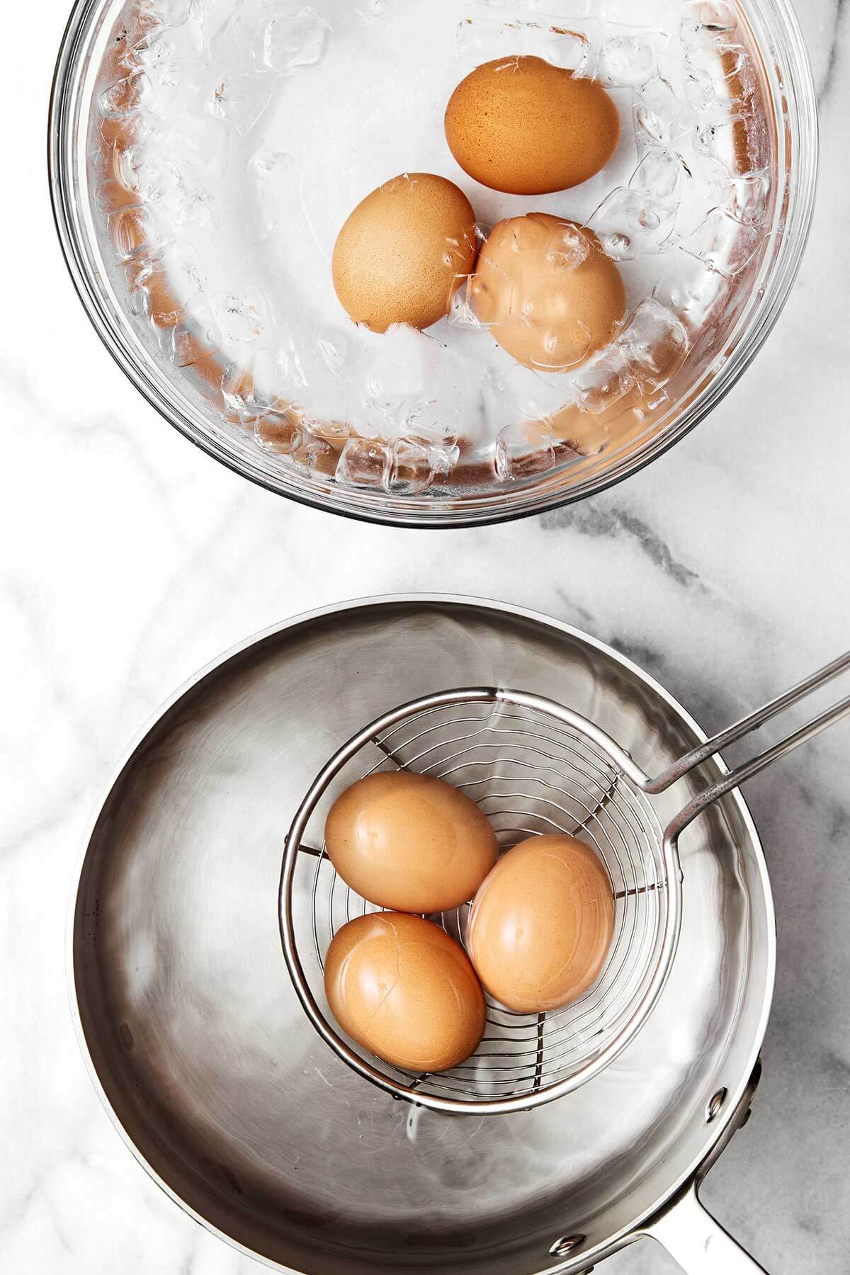 This classic potato salad is easy, flavorful, and loaded with texture. It's the perfect side dish for summer BBQ's, picnics, and dinner parties! Boiling eggs in a pot.
