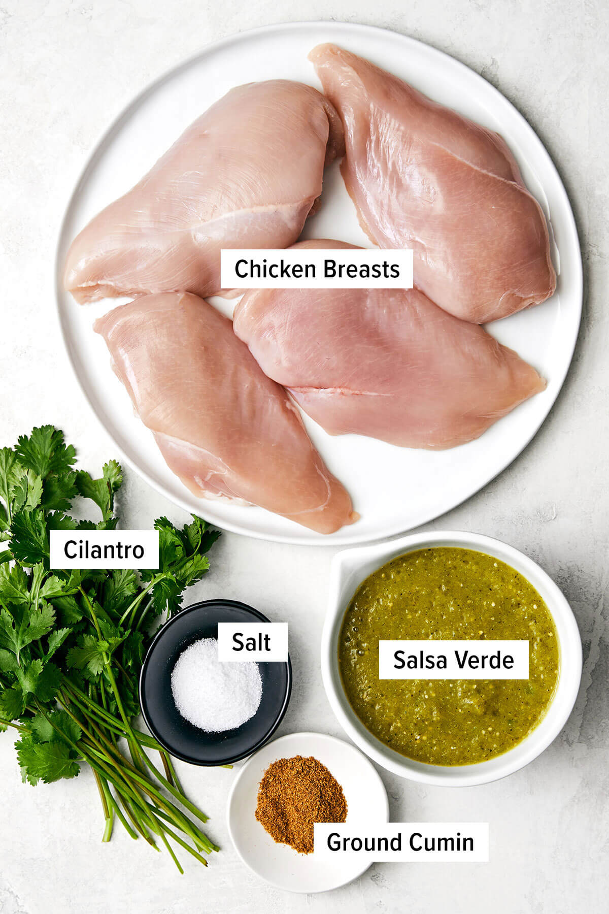 This salsa verde chicken is juicy, tender, and brimming with smoked, tangy, and spicy flavors. Plus, it's made easy right in the slow cooker! Ingredients for salsa verde slow cooker chicken.